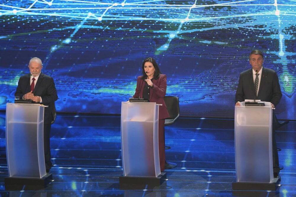 Lula y Bolsonaro durante el debate presidencial